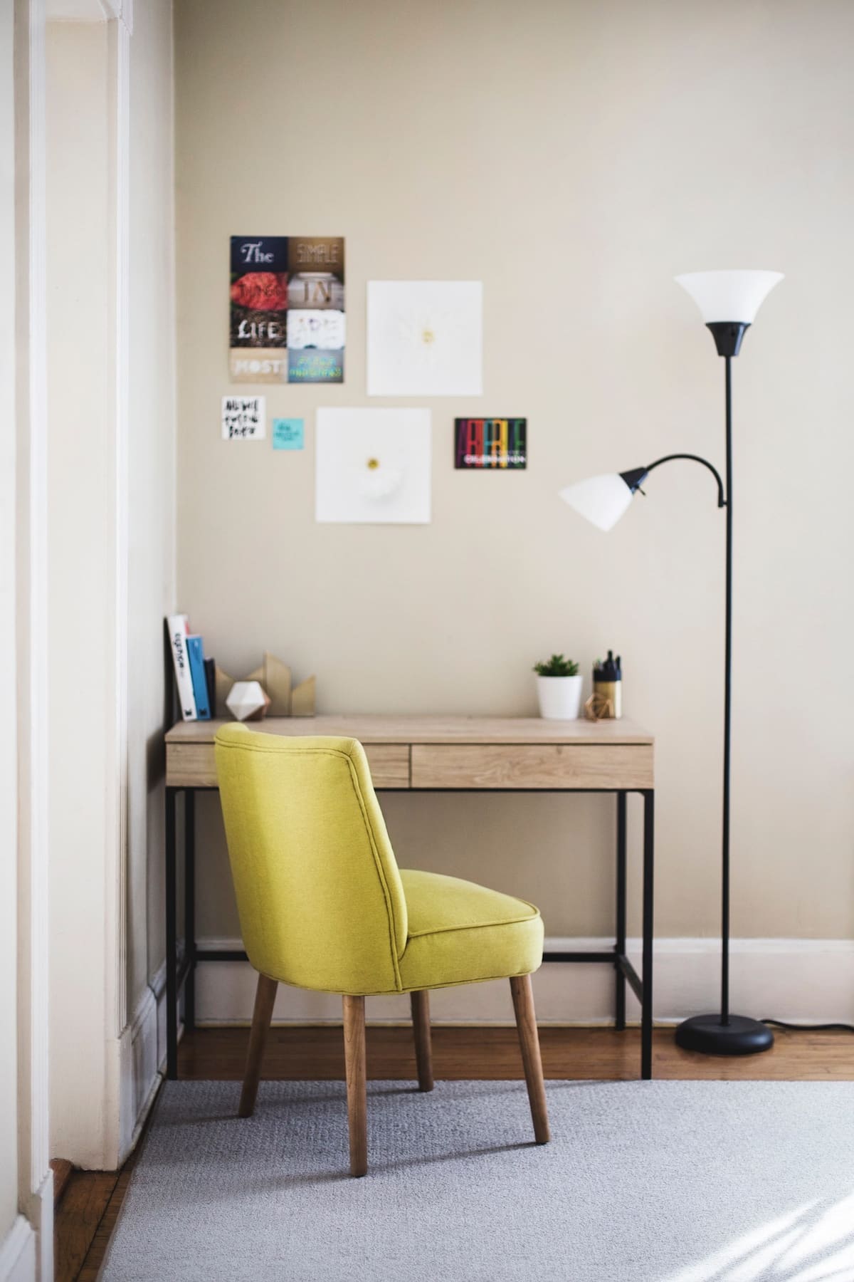 Desk with chair and lamp in a student room